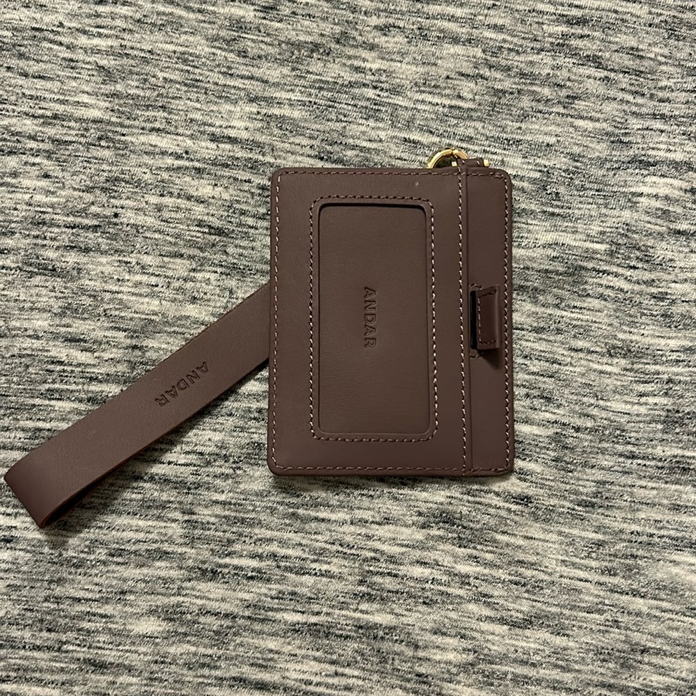 Andar wristlet - plum - never used